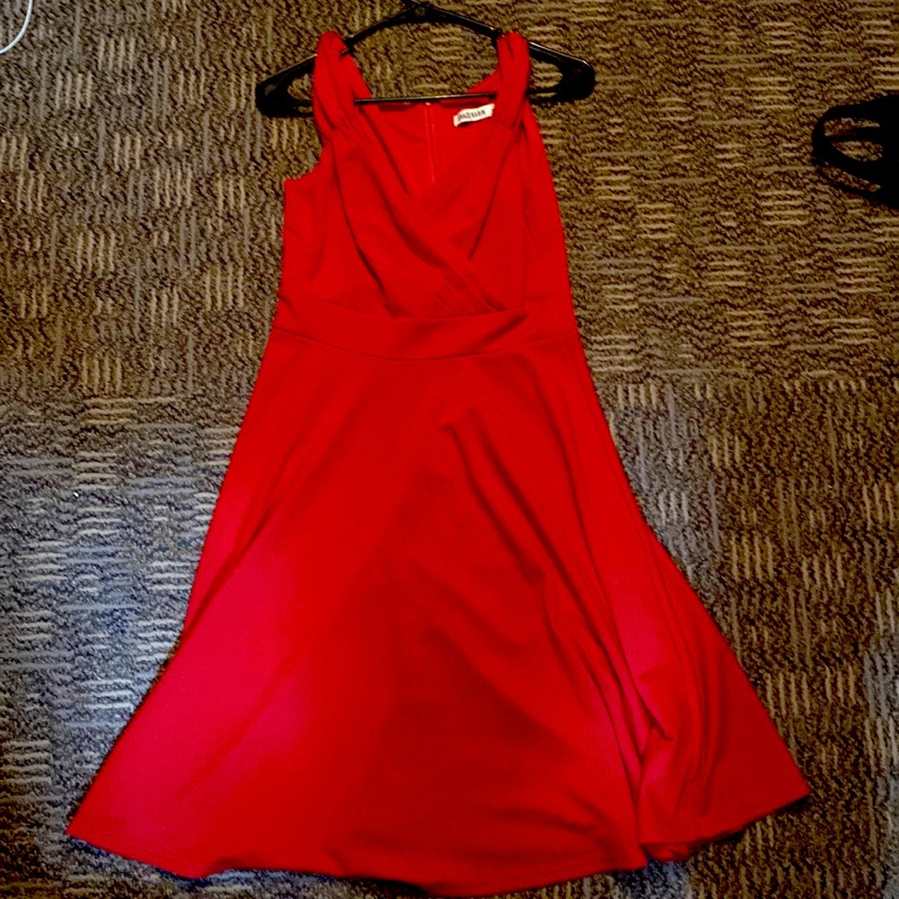 Red knee length dress never worn. Grace Karin